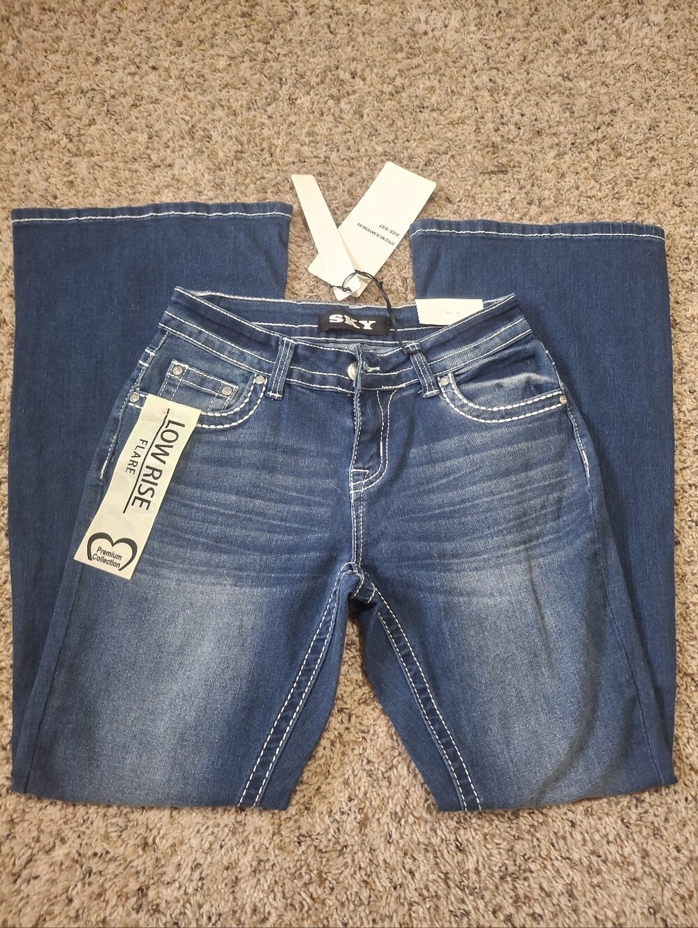 Sky Low Rise Flare Jeans in Dark Blue Denim